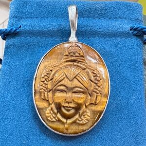 Vintage carved Buddha tiger’s eye sterling silver pendant
